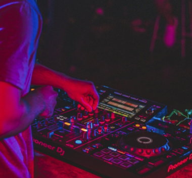 person-playing-audio-mixer-in-concert.jpg person playing audio mixer in concert